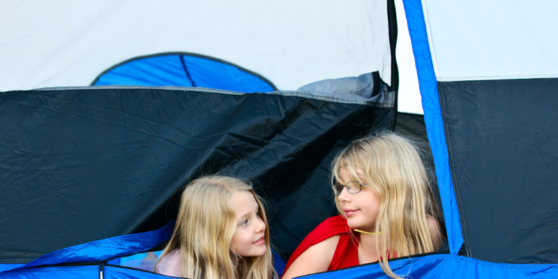 kids camping in backyard as outdoor summer activity