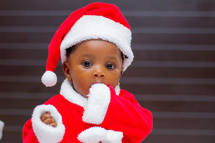 baby in a santa suit