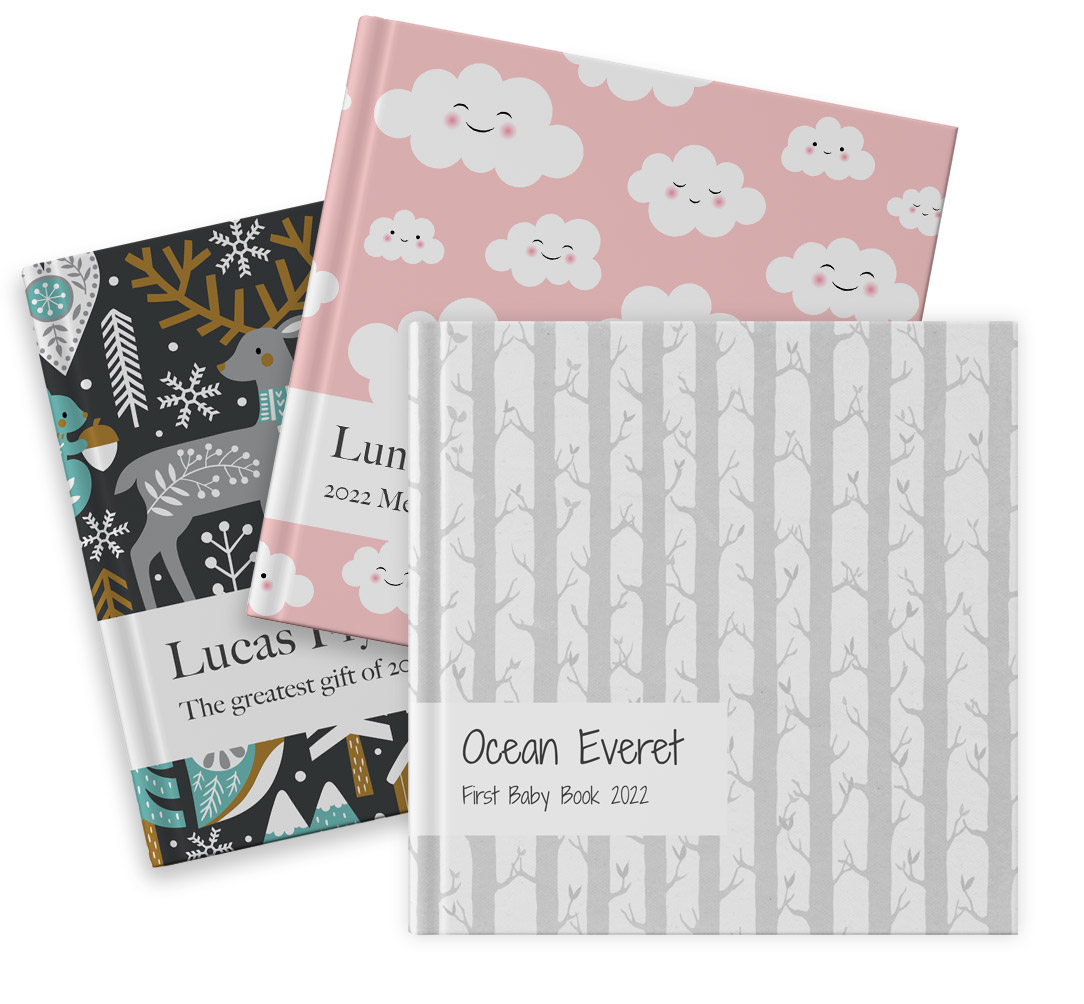 three custom baby books with winter covers