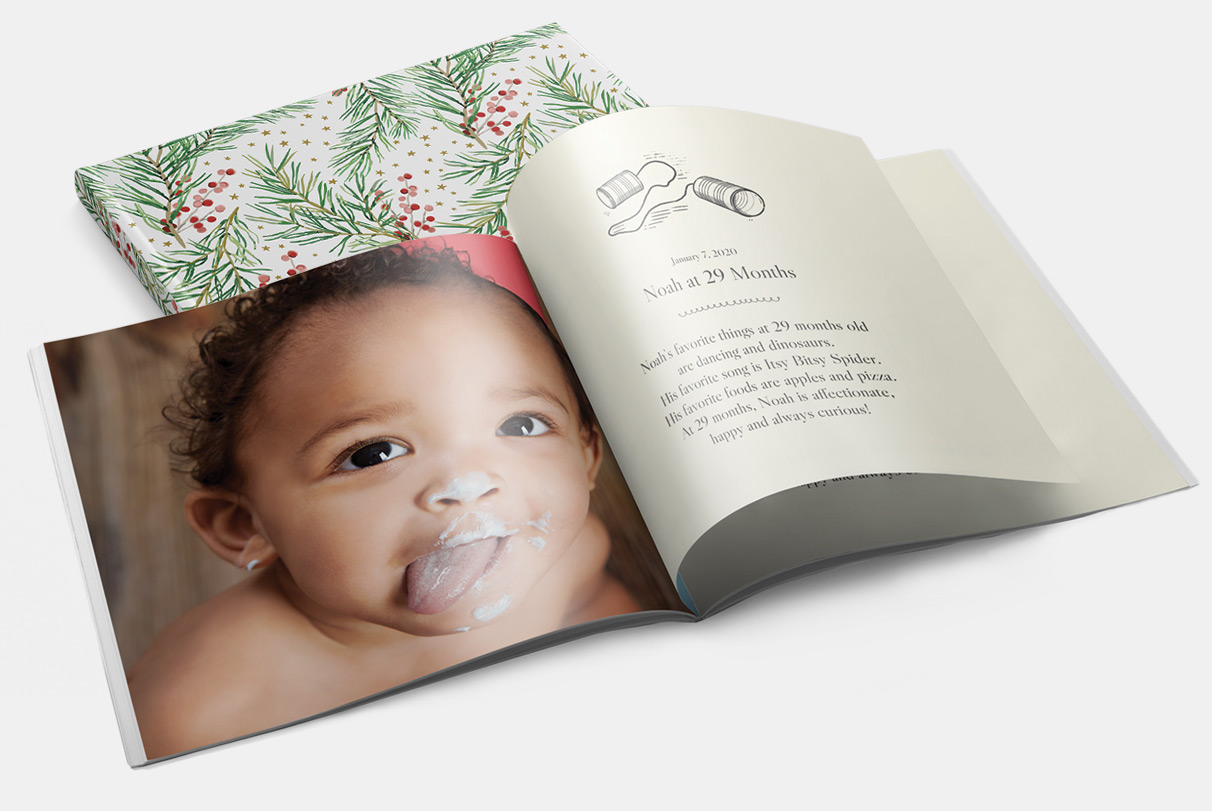 open baby book with holiday cover