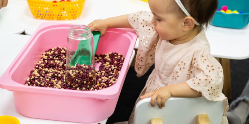 halloween sensory bin with beans or rice