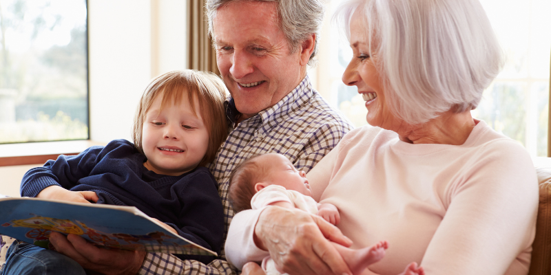 grandparents sharing memories with grandchildren