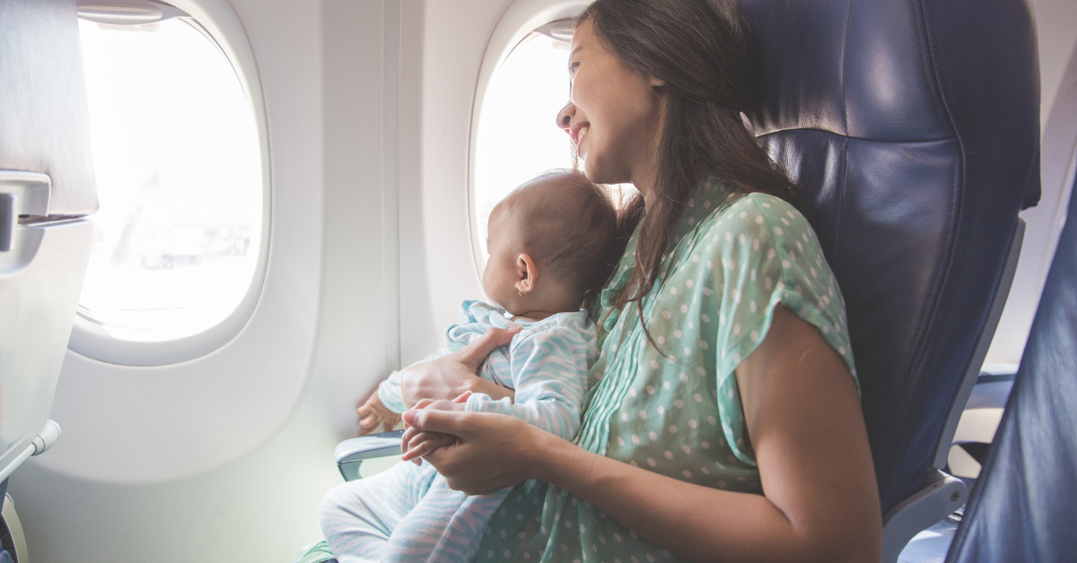 mom and baby traveling in a plane