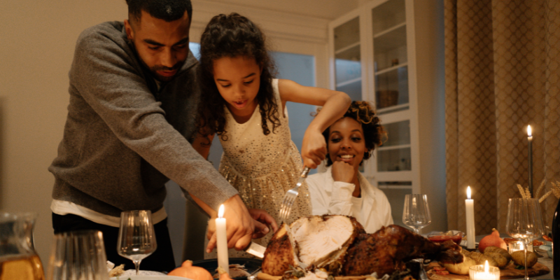 family celebrating kwanzaa