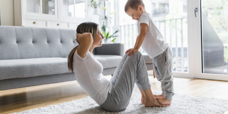 mother exercising during winter to stay healthy